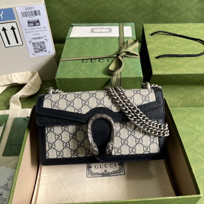 G*u*i clutch bags